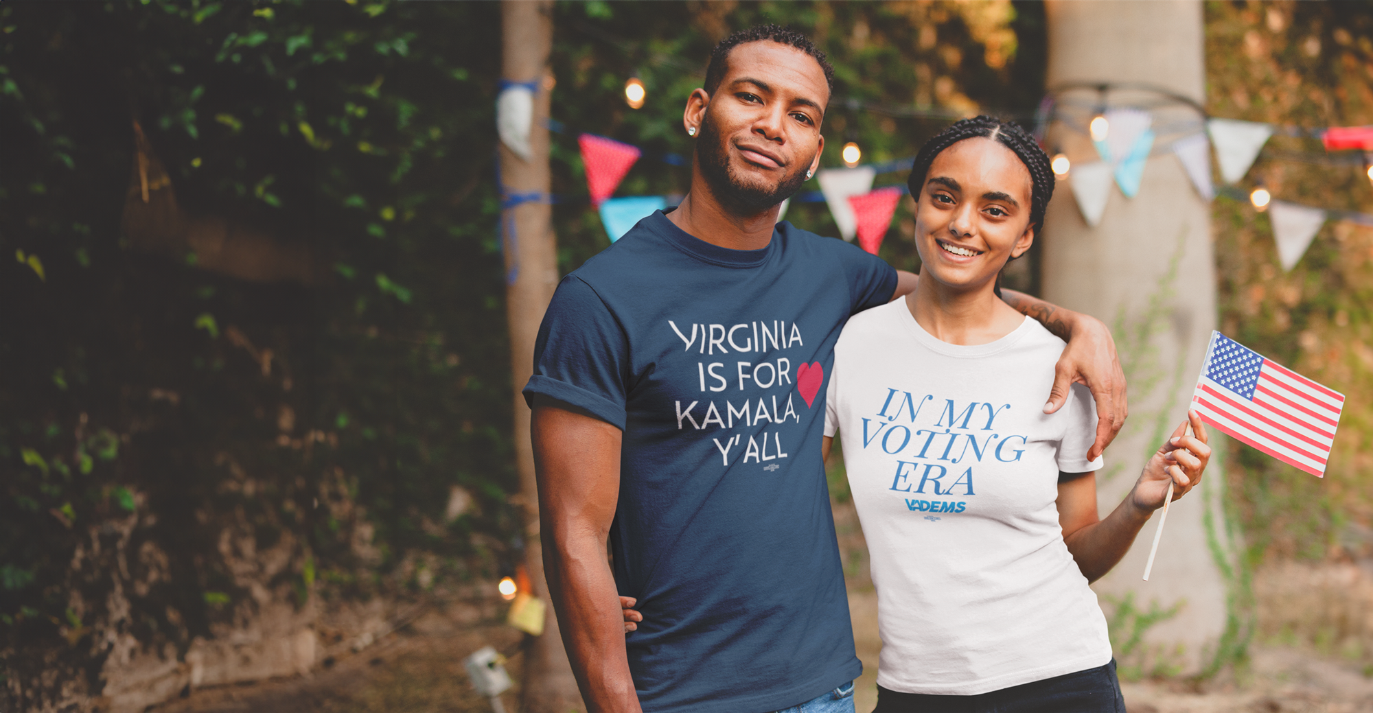 Man and woman wearing VA Dems shirts